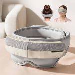 livemor eye and head massager with heat, eye massager, forehand and temple massager, air compression & bluetooth music, 5 modes, 180° foldable, relaxation gifts for mom dad women men Woman using electric eye massager device