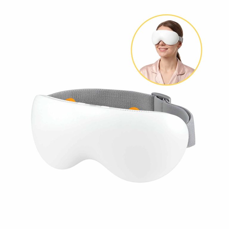 eye massage 03 cold wh 00.jpg Woman wearing white electronic eye massager mask