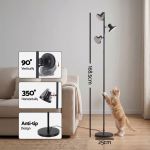 Adjustable black floor lamp with cat beside it