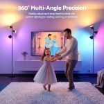 Father and daughter dancing under colourful adjustable floor lamps