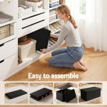 artiss storage ottoman bench folding blanket box toy organiser foot stool black Woman assembling black foldable storage ottoman in closet