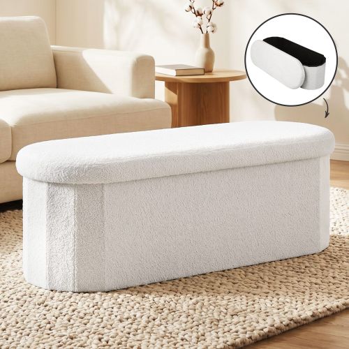 White upholstered ottoman in modern living room