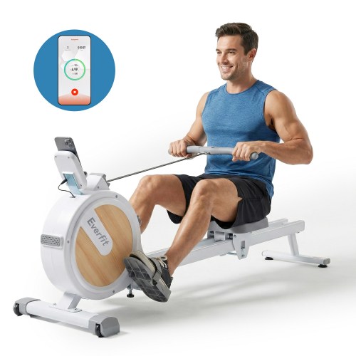 Man using smart rowing machine at home