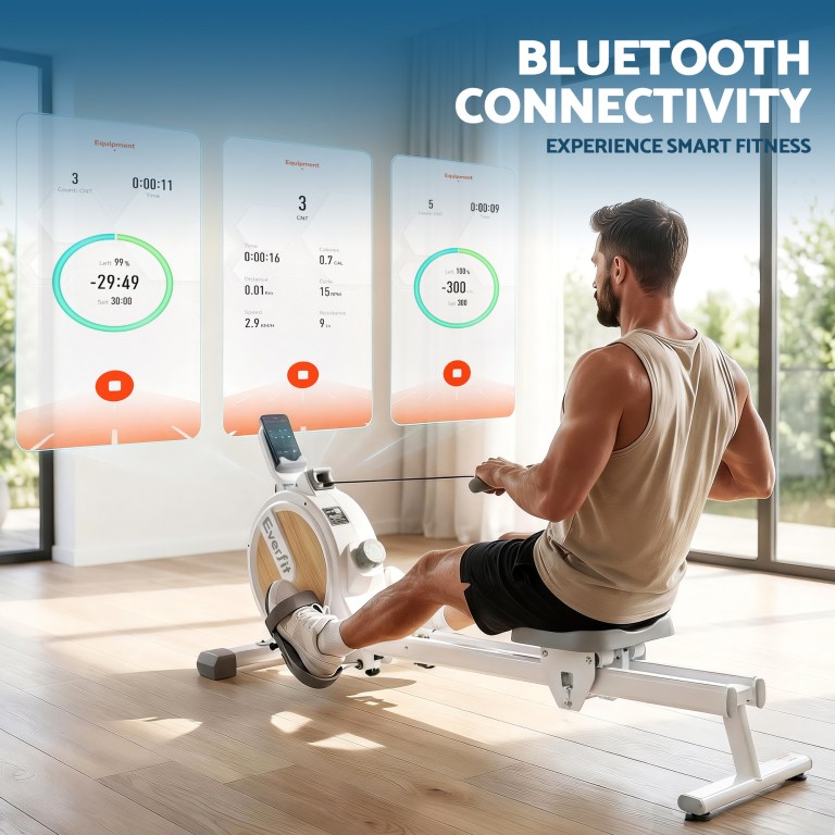 Man using smart rowing machine with Bluetooth display