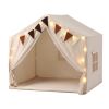 Children's play tent with fairy lights and bunting