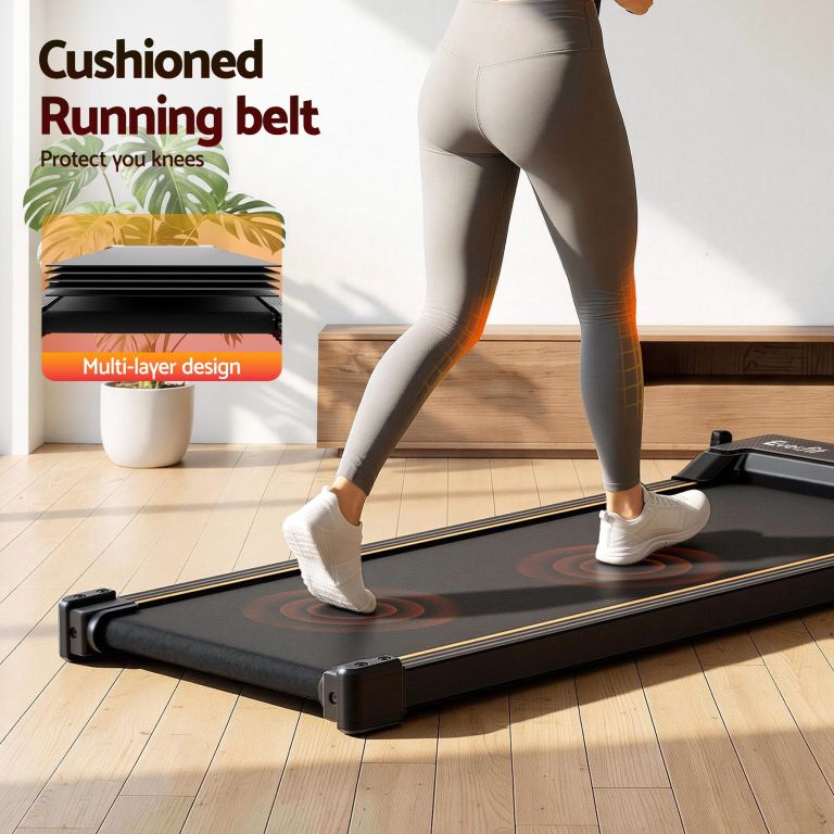 Person walking on cushioned home treadmill belt