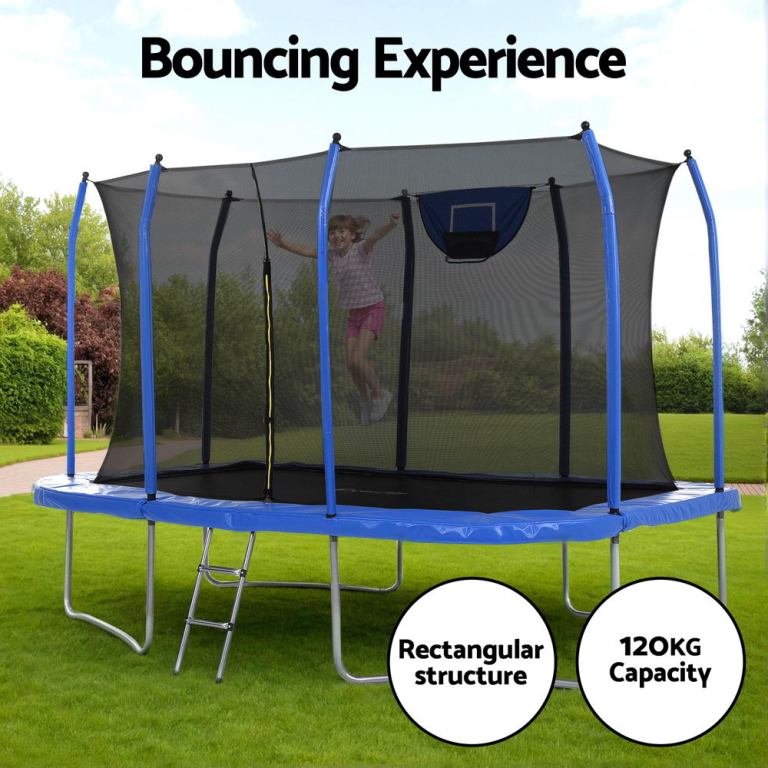 Child jumping on rectangular backyard trampoline with net