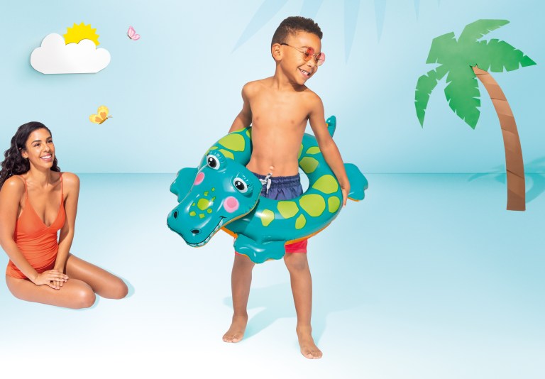 intex big animal rings 58221 Child with crocodile float and smiling woman
