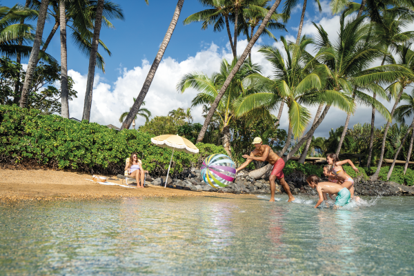 intex beach ball jumbo 107cm 59065 Family playing with beach ball on tropical shore