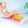intex king kool inflatable pool lounge 58802 Woman relaxing on colourful inflatable pool float