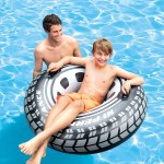 intex monster truck tube 56268 Father and son in pool with inflatable tube