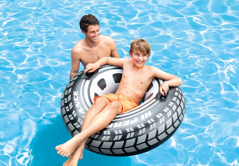 intex monster truck tube 56268 Father and son in pool with inflatable tube