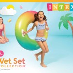 intex rainbow ombre tube pool float 58202 Girl holding colourful inflatable swim ring pool float