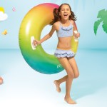intex rainbow ombre tube pool float 58202 Girl with inflatable ring and smiling woman