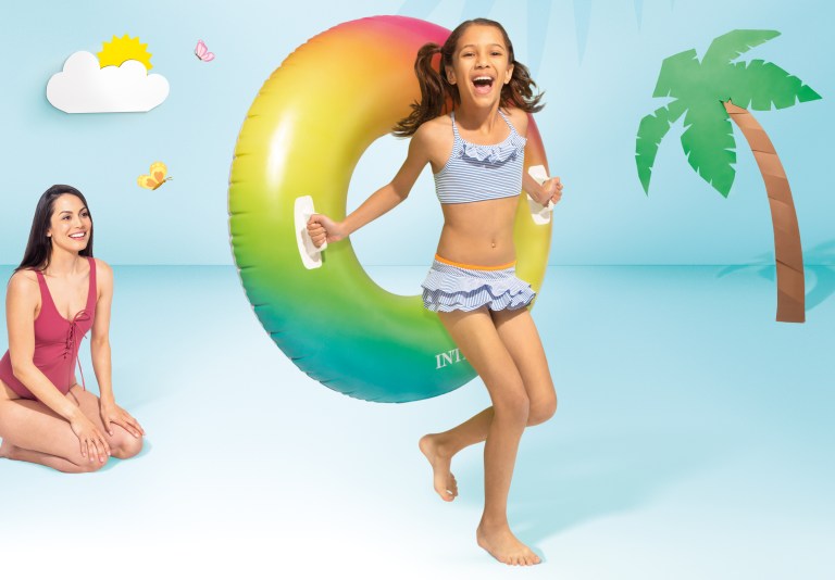 intex rainbow ombre tube pool float 58202 Girl with inflatable ring and smiling woman