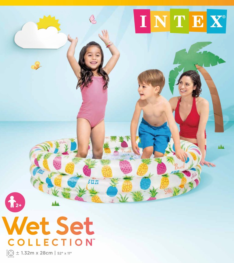 Children playing in pineapple inflatable paddling pool
