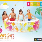 Children splashing in colourful inflatable backyard pool