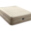 Beige inflatable air mattress with built-in pump
