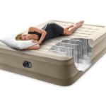 Woman sleeping on inflatable air mattress with cutaway