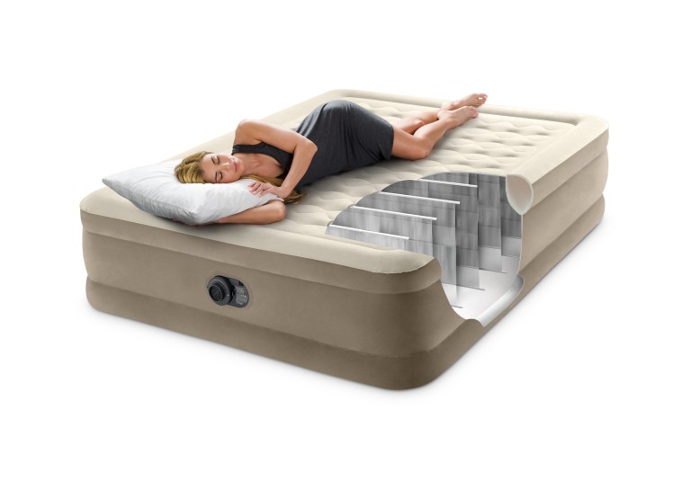 Woman sleeping on inflatable air mattress with cutaway