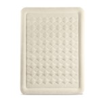 Beige inflatable air mattress with textured surface