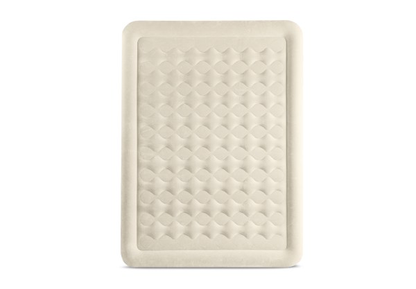 Beige inflatable air mattress with textured surface
