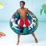 intex river rat swim tube pool float 68209 Boy with inflatable swim ring and smiling woman
