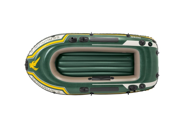 Green inflatable dinghy on white background