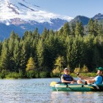 Two men fishing on mountain lake