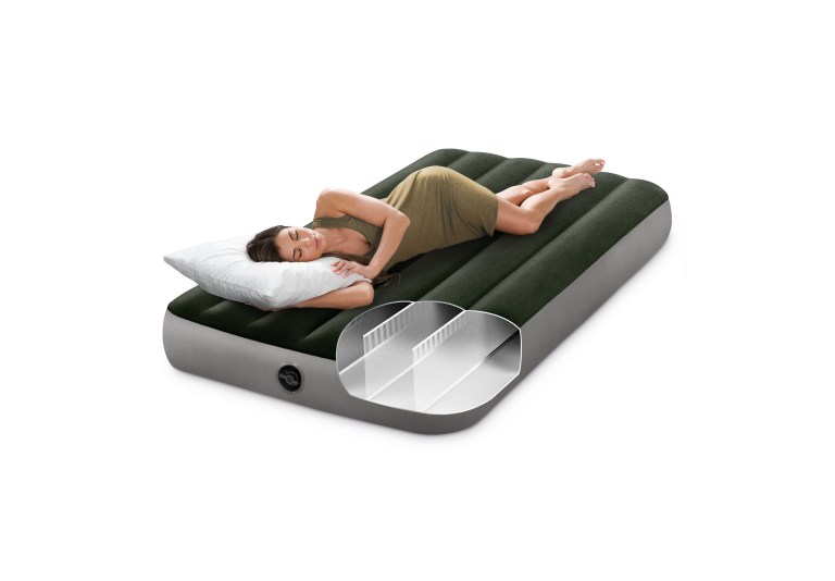 intex single (twin) classic airbed with built in pump 64761 Woman resting on green inflatable air mattress