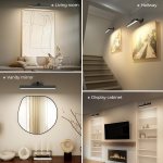 Wall-mounted picture lights in modern home interiors