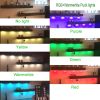 RGB puck lights illuminating floating shelves in colours