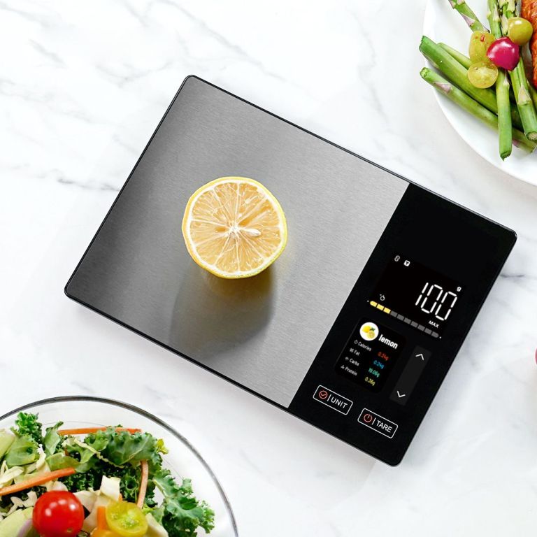smart digital food kitchen scale with nutritional calculator, on screen nutrient info, free app for calorie & macro tracking, ai scan, personal goals, for weight loss and keto, 11lb/5kg Half lemon on digital kitchen scale display