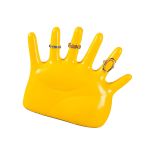 Yellow mannequin hand displaying decorative rings