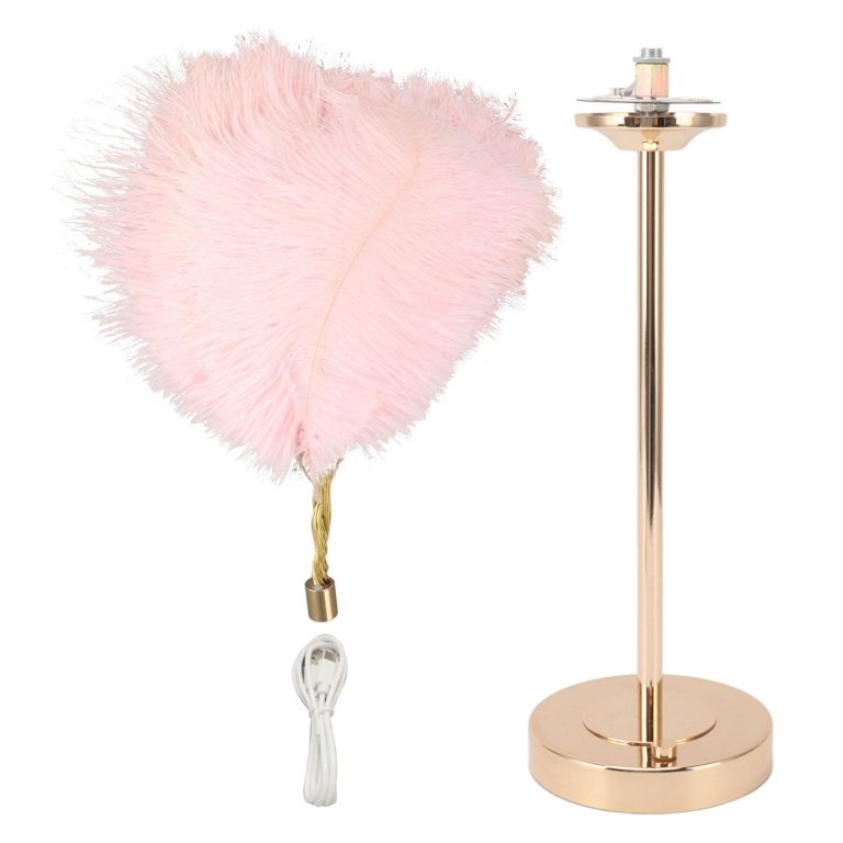 Pink feather lampshade with gold lamp base