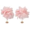 Two pink feather arrangements on gold stands