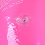 heart pool float pvc material skin friendly lightweight pink romantic style floating tubes for summer Close-up of pink inflatable with air valve