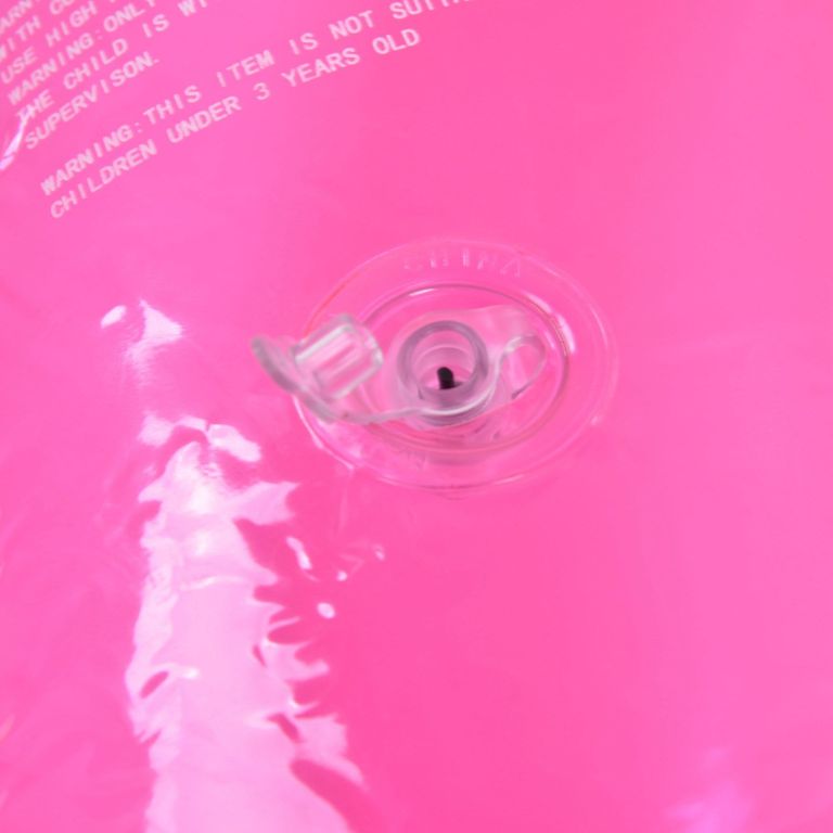 heart pool float pvc material skin friendly lightweight pink romantic style floating tubes for summer Close-up of pink inflatable with air valve
