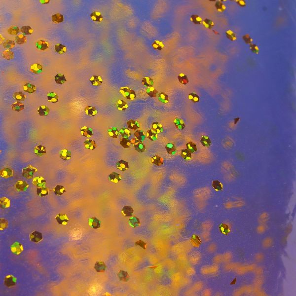 colored swimming rings bright colors sequin thickened inflatable glitter swim rings for swimming pool Gold glitter pieces on iridescent blue surface