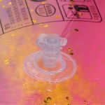 colored swimming rings bright colors sequin thickened inflatable glitter swim rings for swimming pool Close-up of inflatable pool float valve