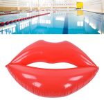 Indoor pool and red inflatable lips float