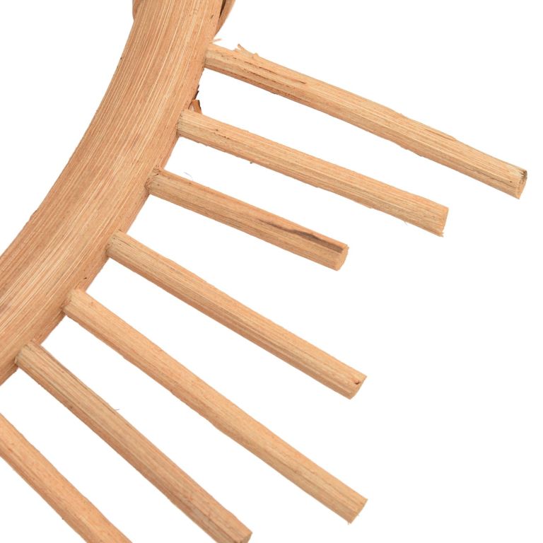 Close-up of wooden rake tines