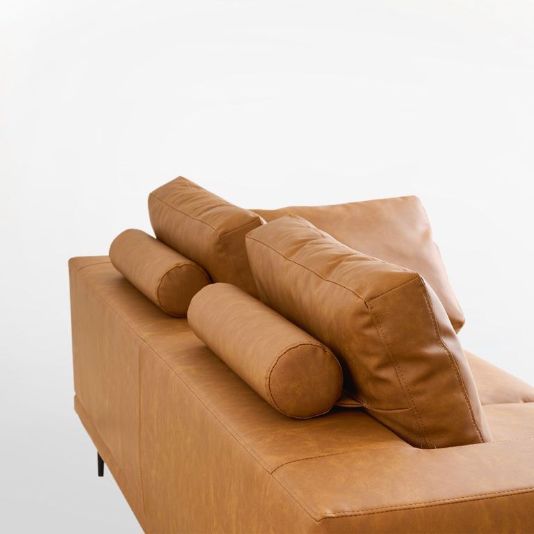 modern deep seated sofa, two seater, faux leather, brown brown pu leather Tan leather sofa with bolster cushions