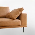 modern deep seated sofa, two seater, faux leather, brown brown pu leather Tan leather sofa with cushion and black legs
