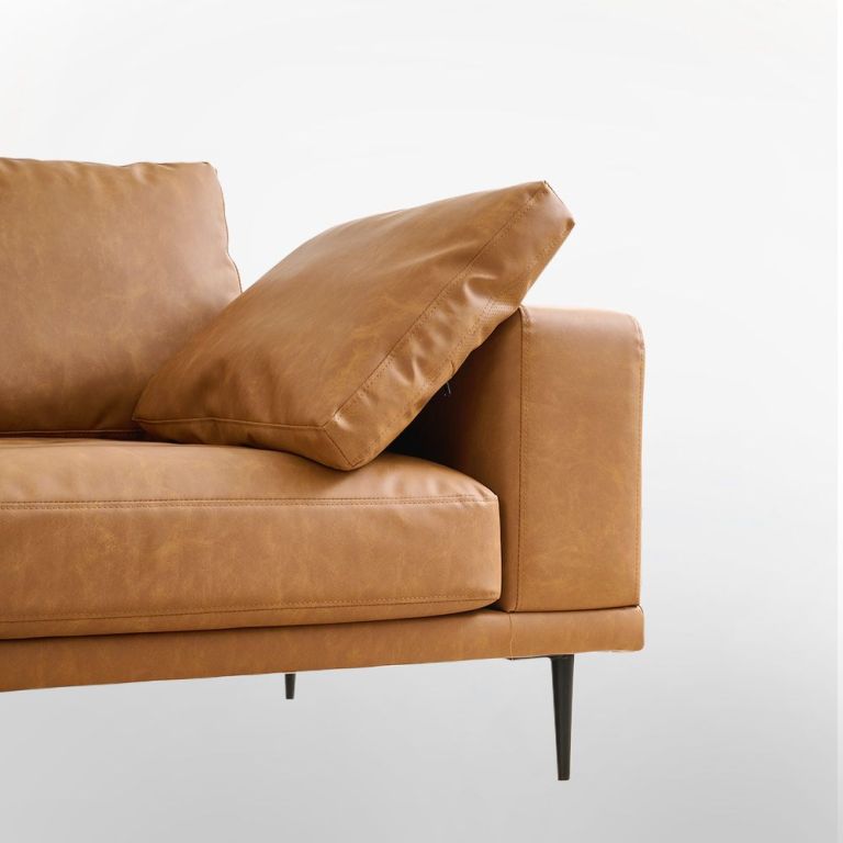 modern deep seated sofa, two seater, faux leather, brown brown pu leather Tan leather sofa with cushion and black legs