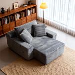 Grey corduroy chaise lounge in modern living room