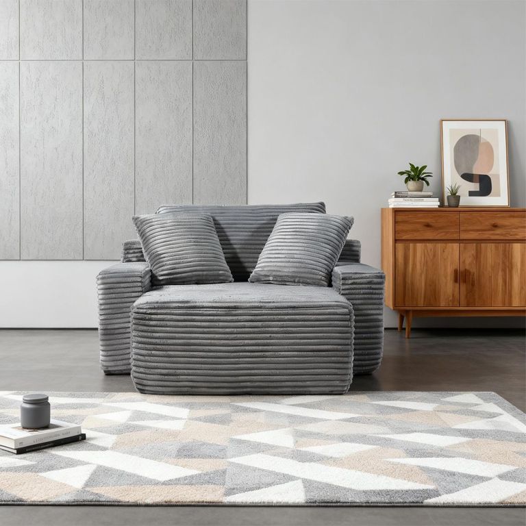 Modern grey armchair in minimalist living room