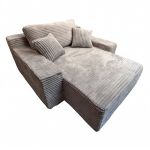 Beige corduroy chaise lounge with matching cushions