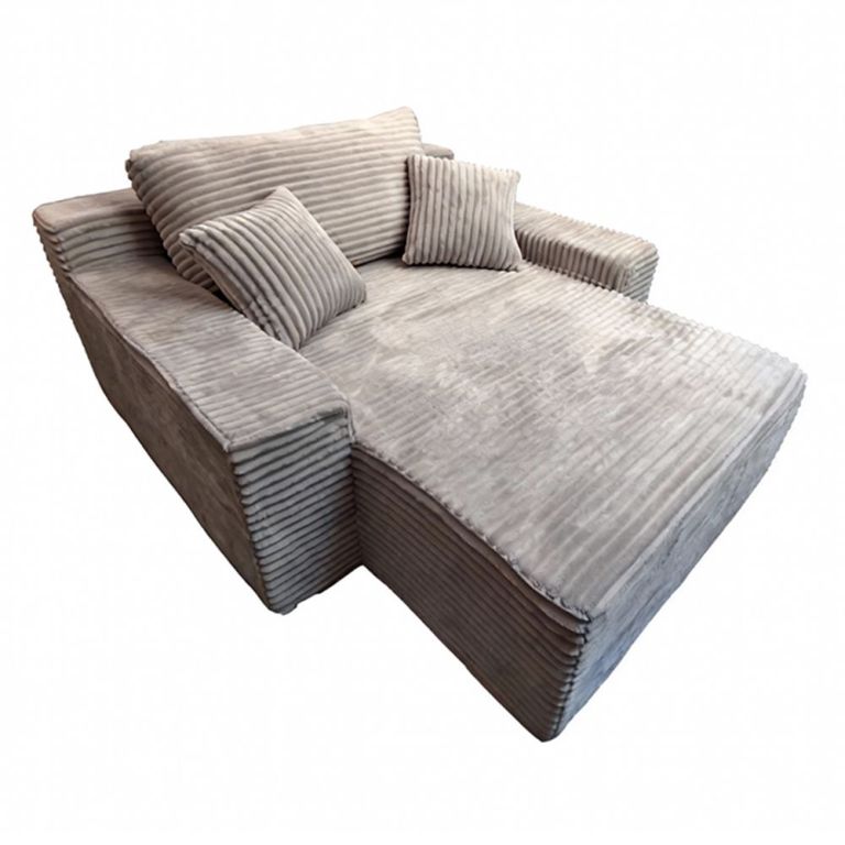 Beige corduroy chaise lounge with matching cushions