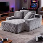 Grey corduroy lounge chair in gaming room